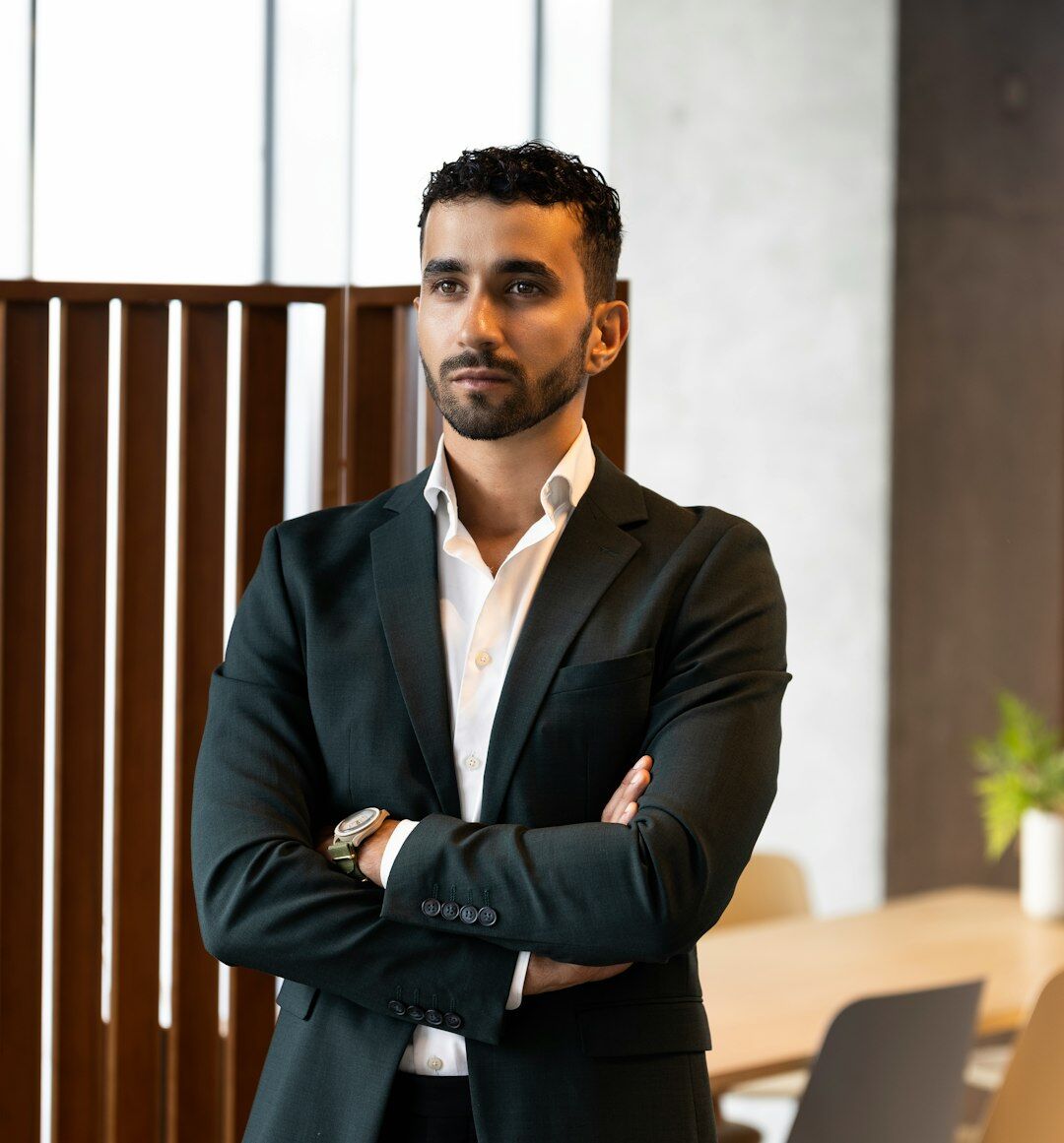 Professional male media trainer in business attire